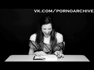 porn actress standing reading a book while sitting on a vibrator solo